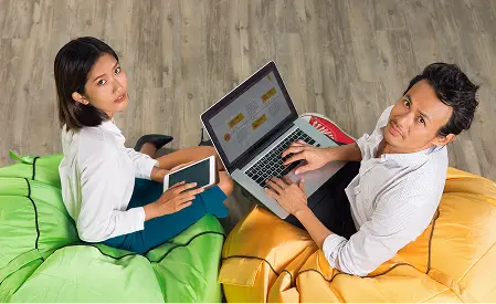 asian-man-woman-working-bright-chairs